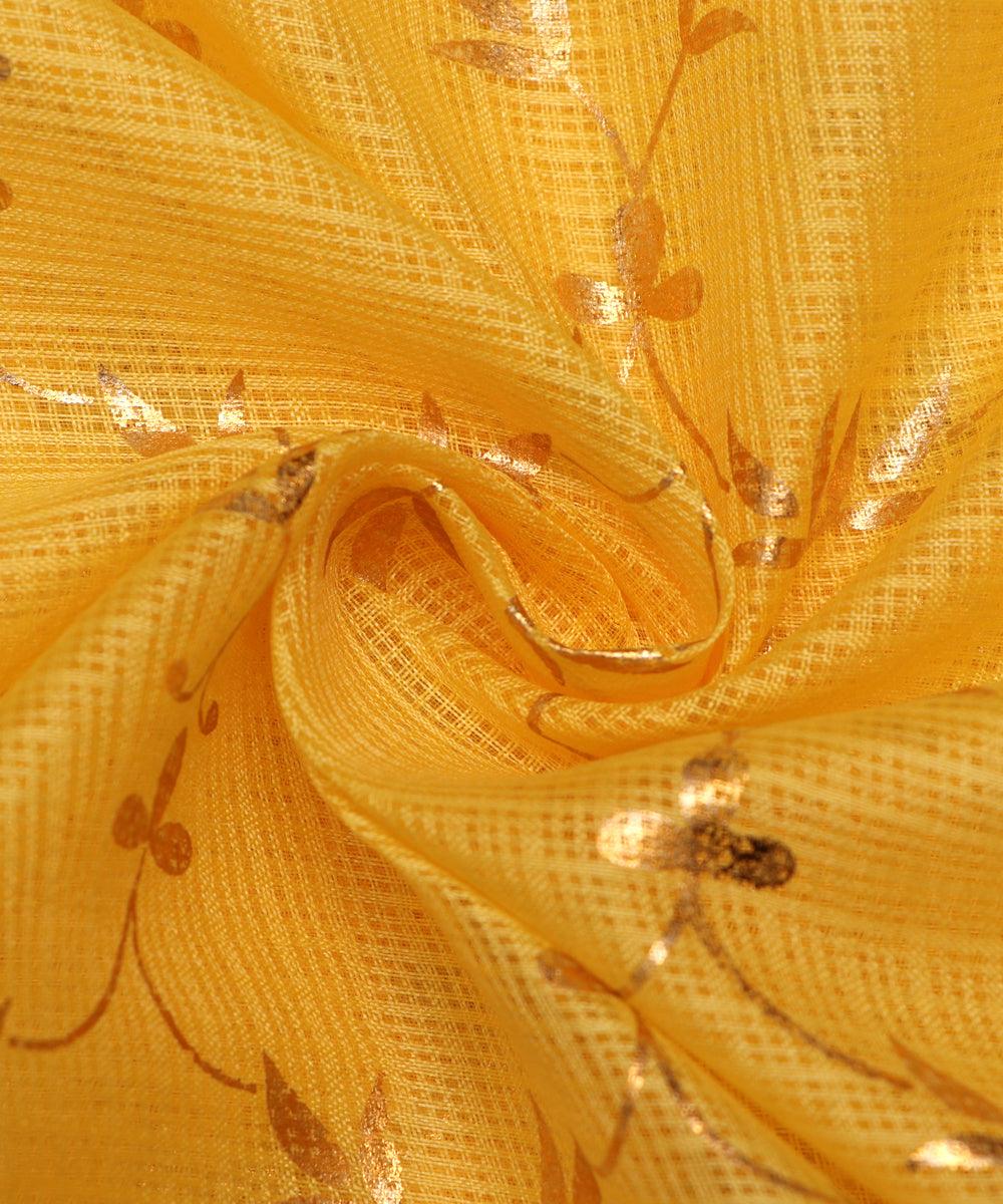 yellow floral print kota doria fabric