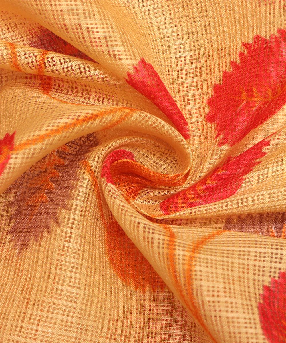 yellow and red leaf print kota doria fabric