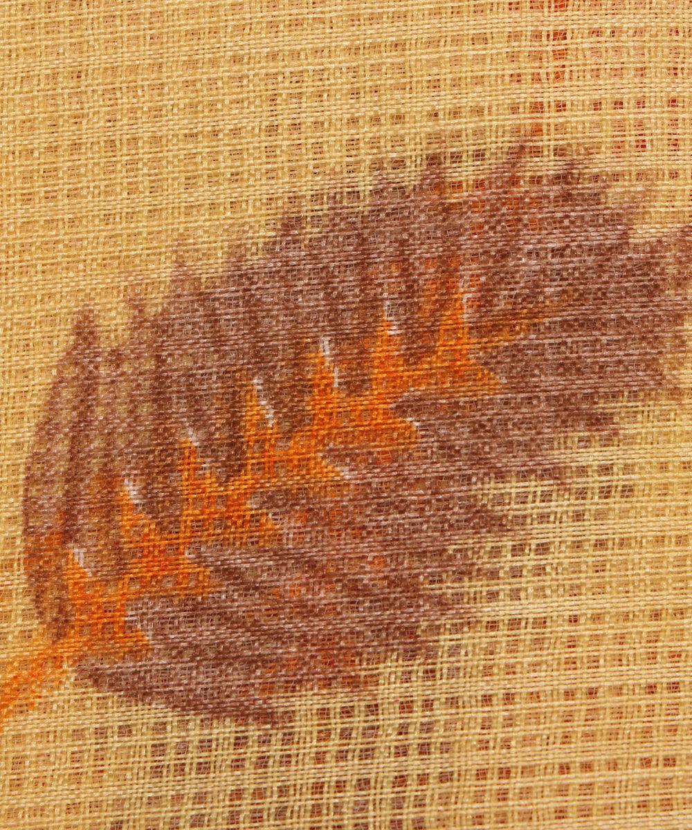 yellow and red leaf print kota doria fabric