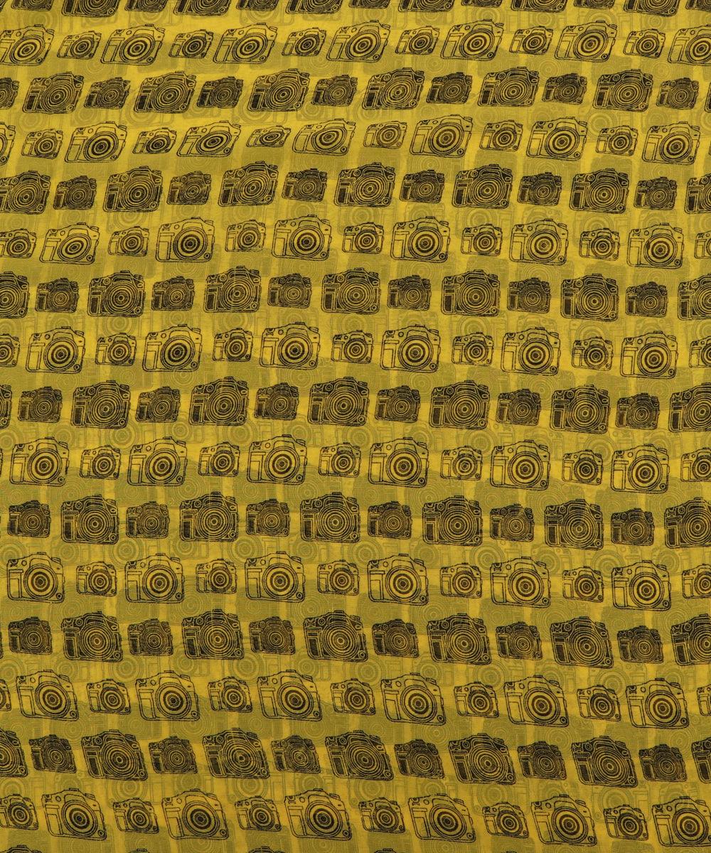 green camera print georgette fabric