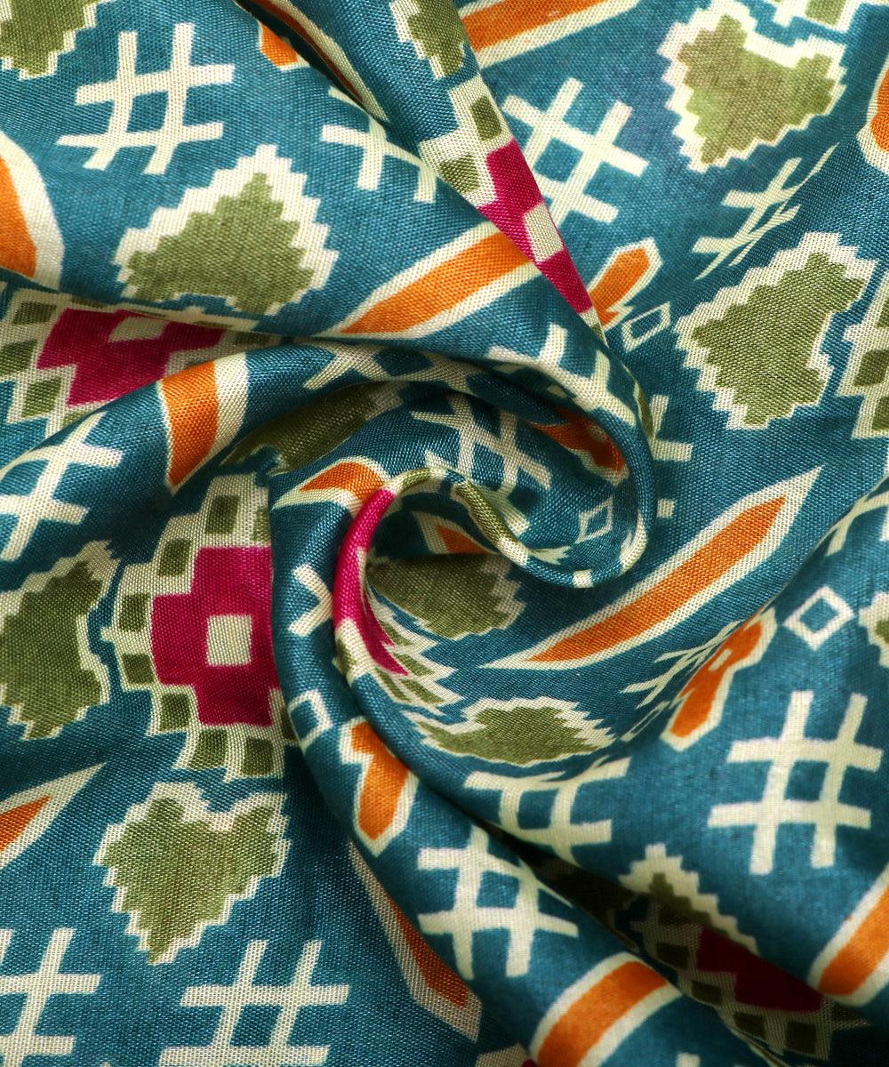 cyan blue red patola print silk fabric