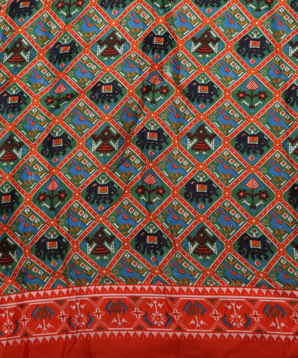 green rust blue black patola print silk fabric