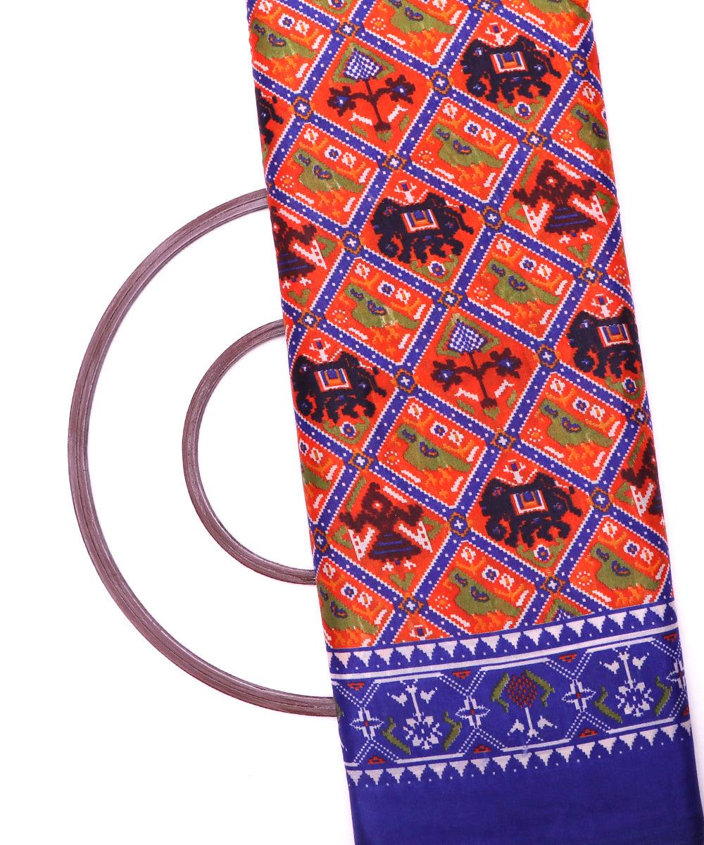 orange blue green patola print silk fabric