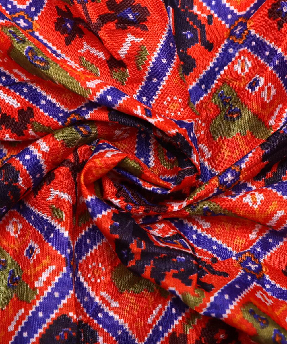 orange blue green patola print silk fabric