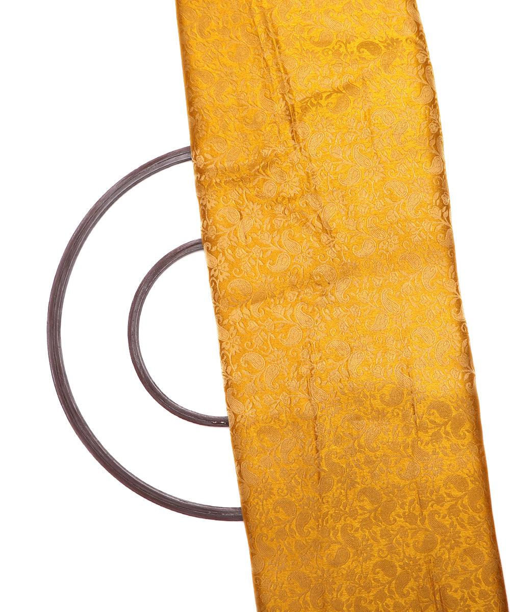 yellow and golden paisley design brocade silk fabric