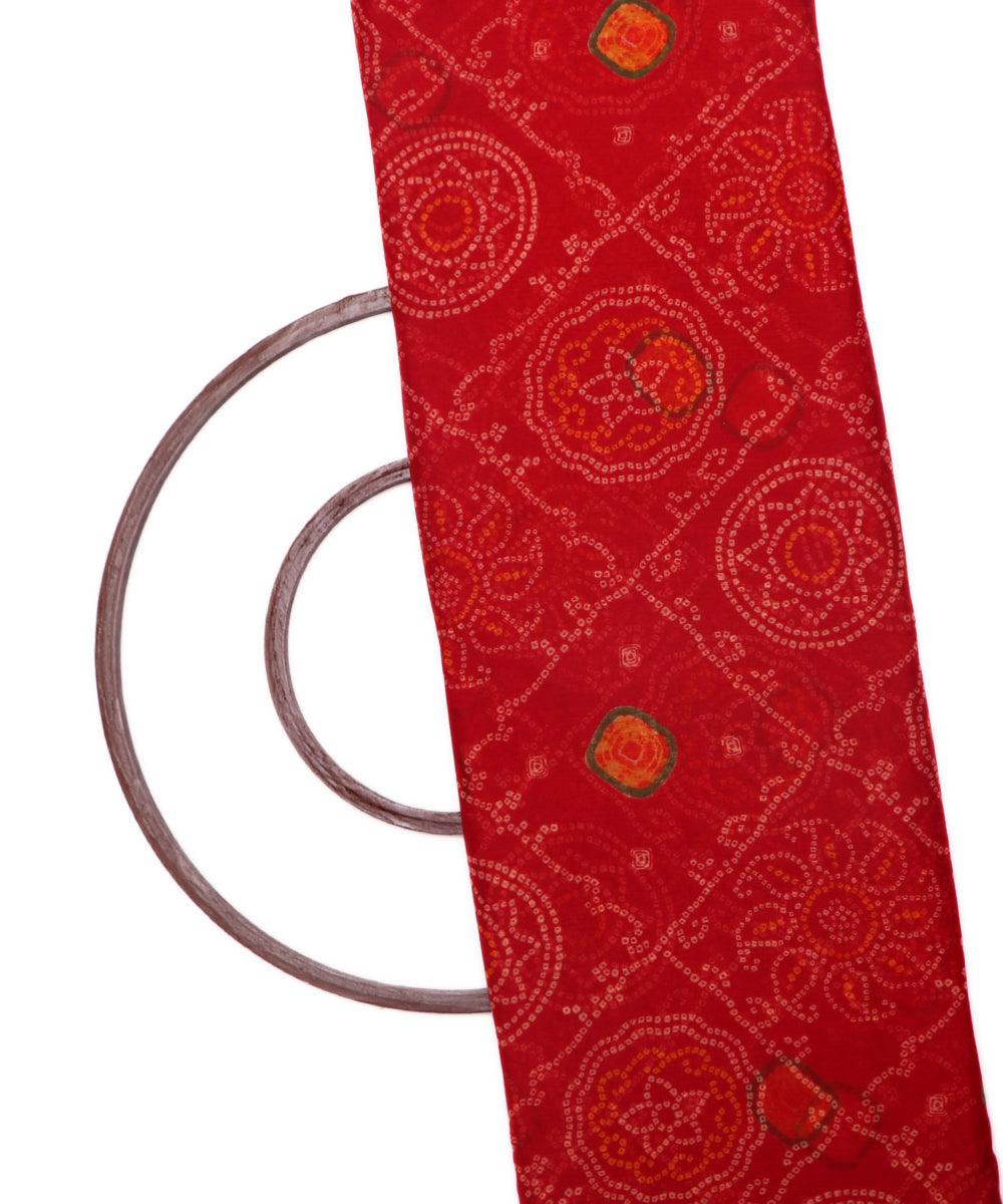 red bandhani print chiffon fabric