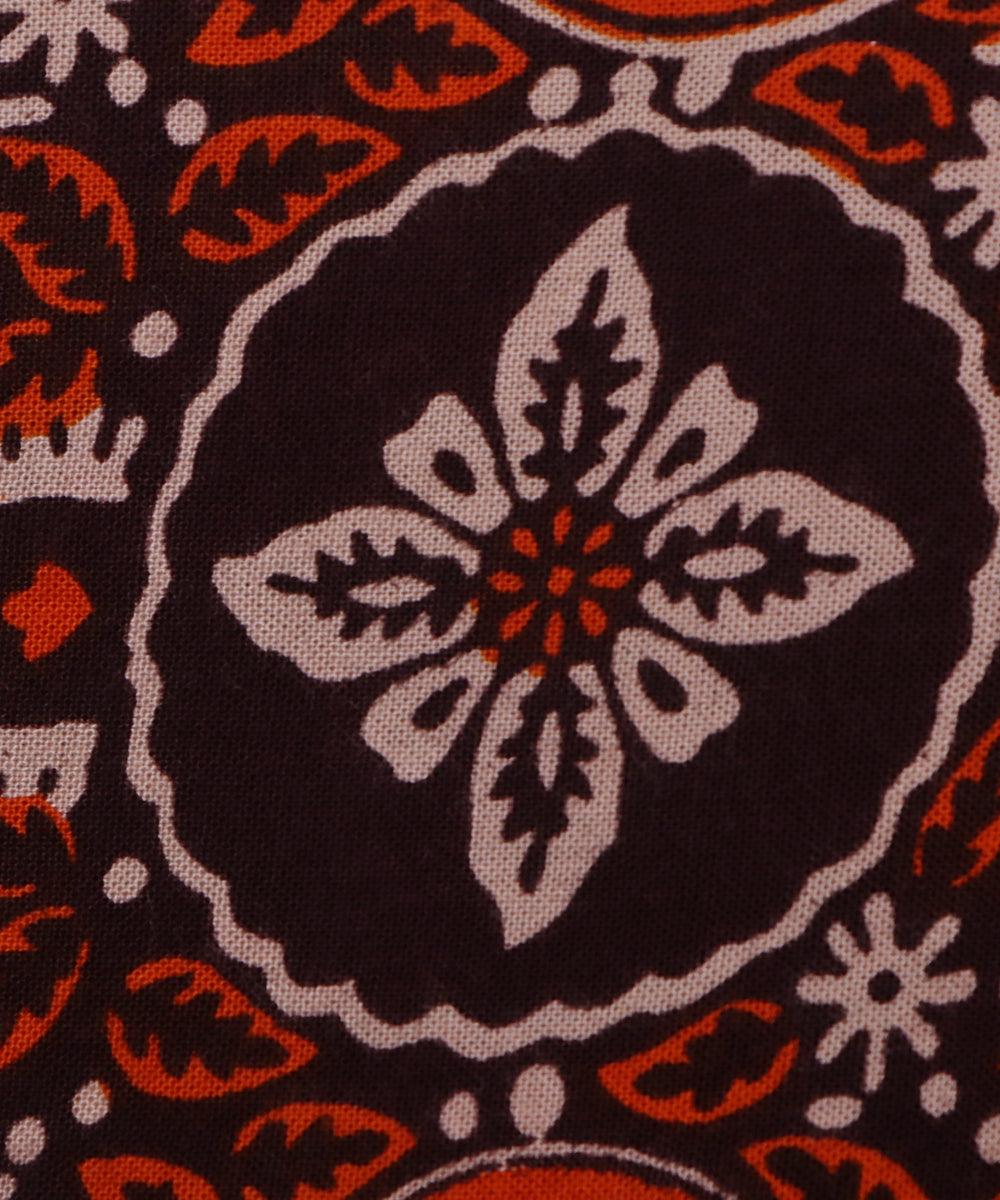 brown and orange ajrakh print rayon fabric