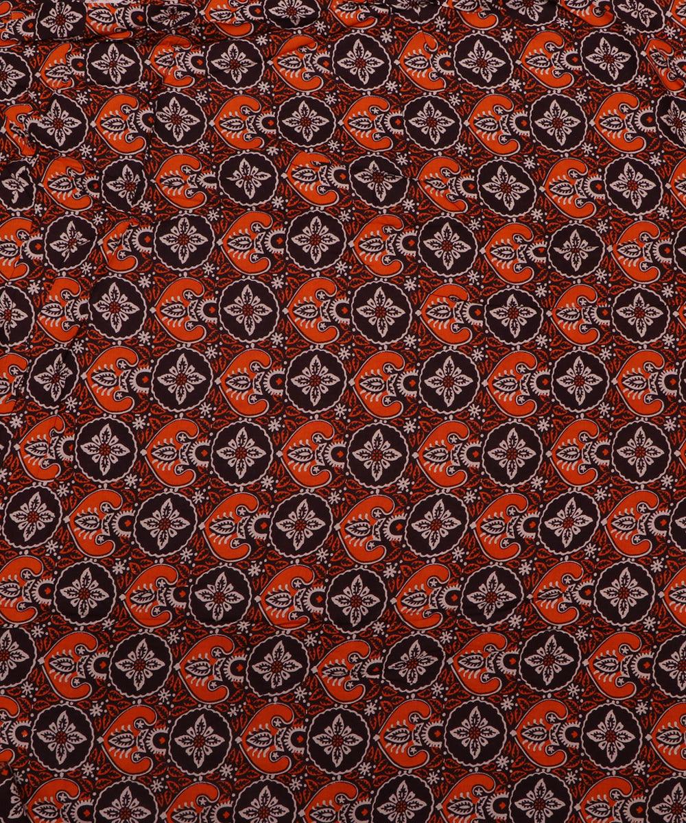 brown and orange ajrakh print rayon fabric