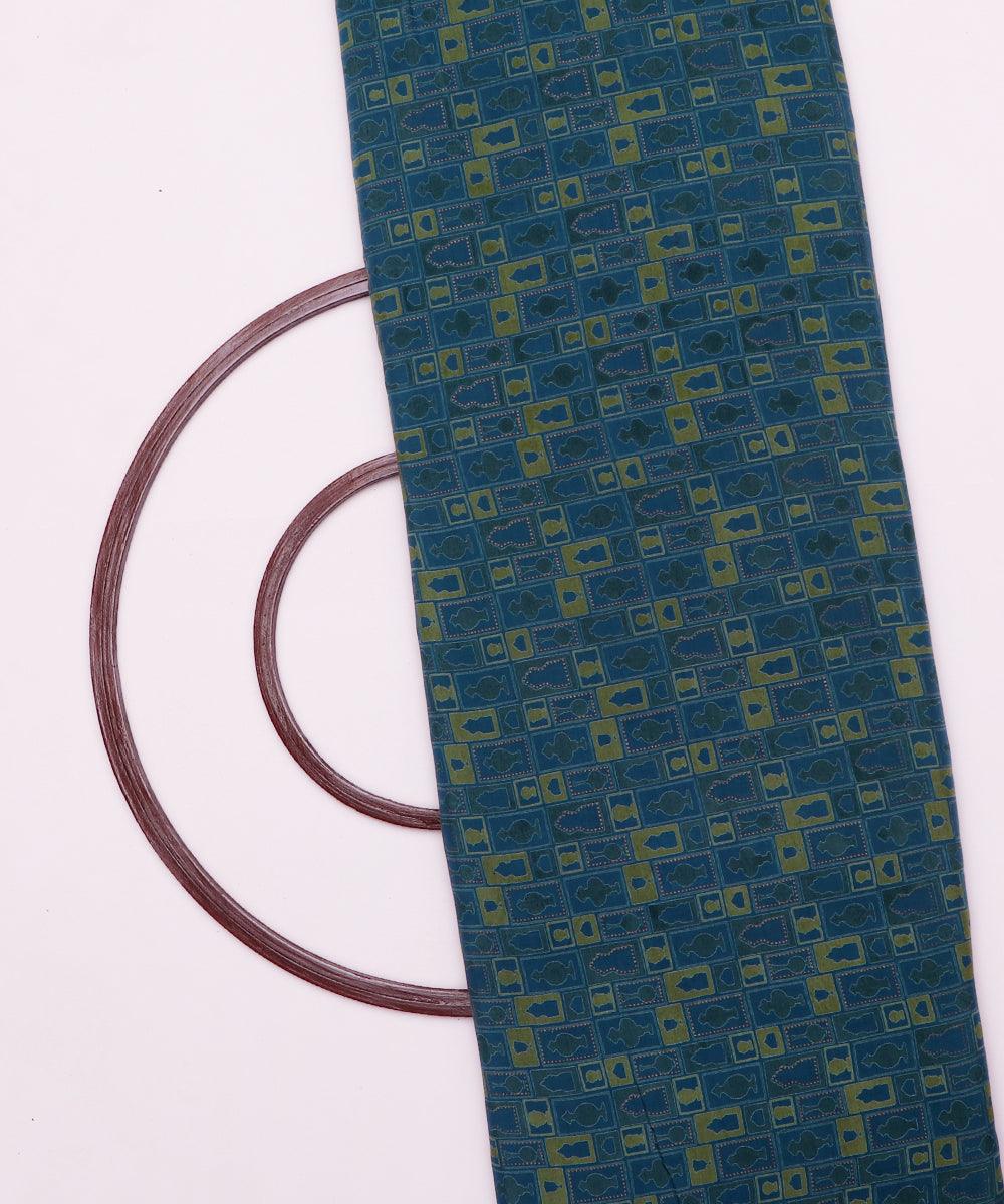 teal and green object print rayon fabric