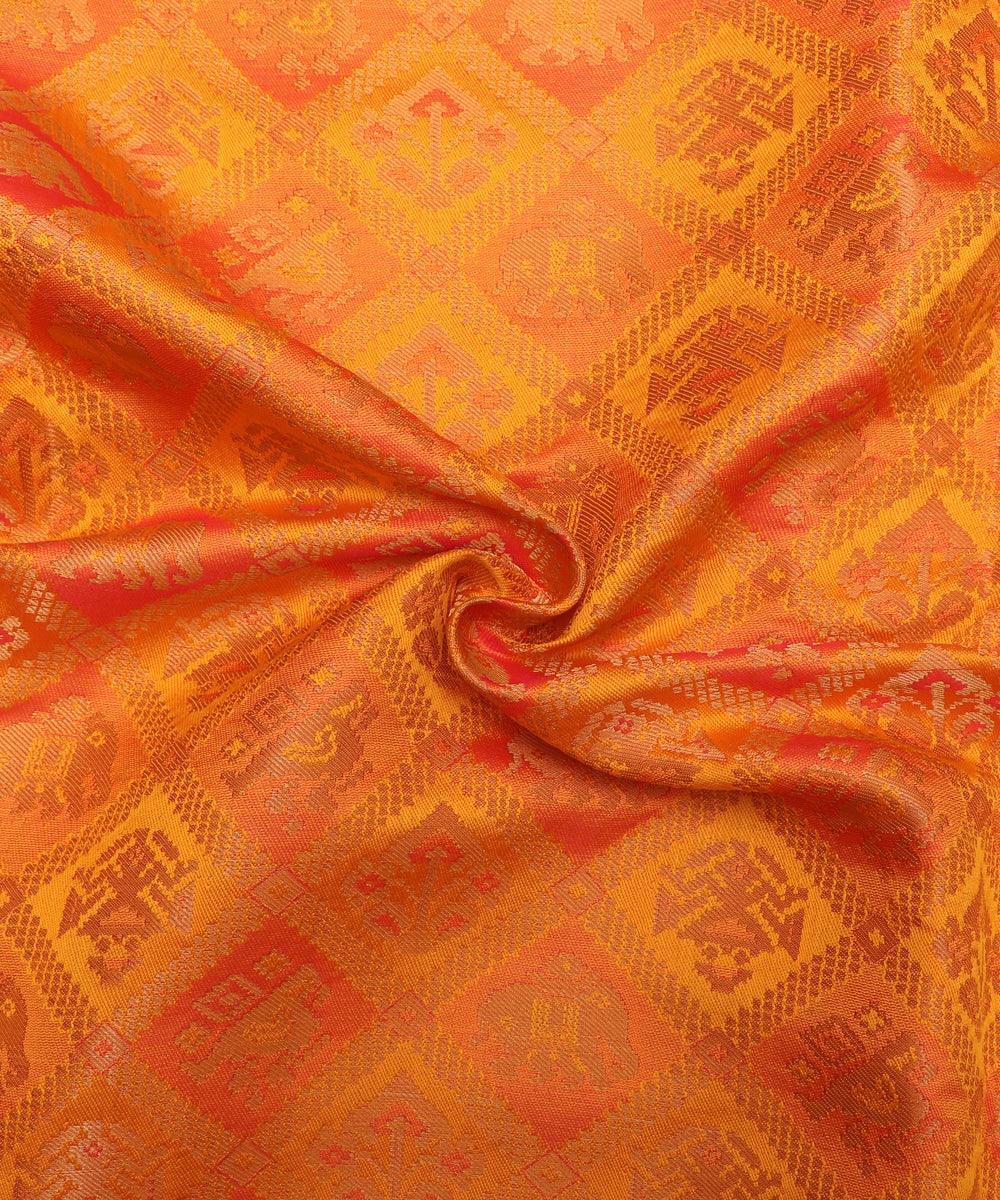 yellow colour traditional print brocade silk fabric