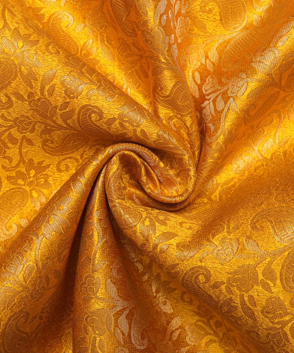 yellow and golden paisley design brocade silk fabric