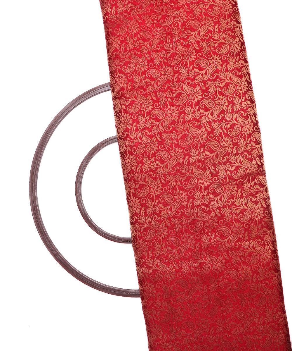 maroon and golden paisley design brocade silk fabric